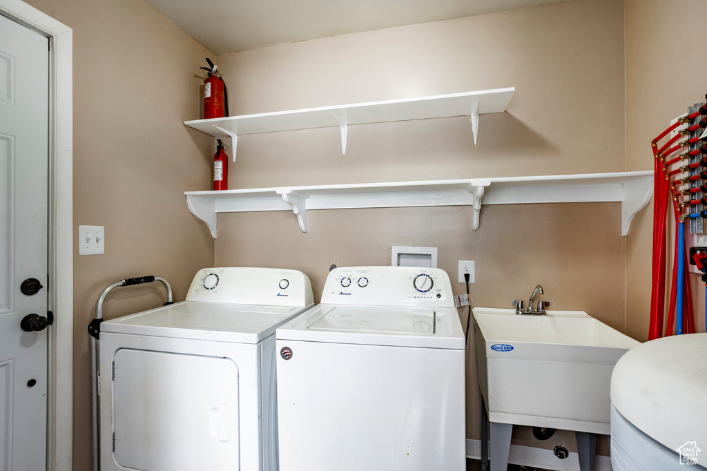Clothes washing area with washing machine and clothes dryer