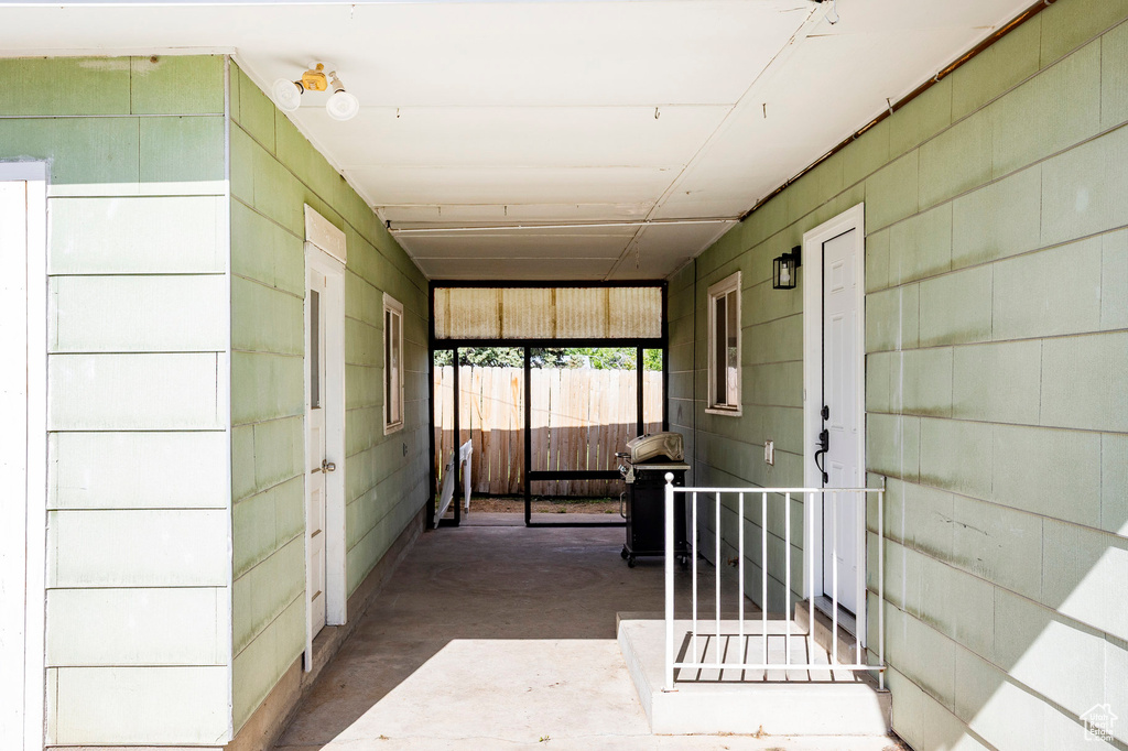 Hallway with concrete flooring