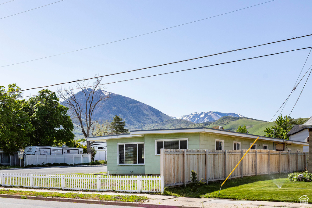 View of front of property featuring a mountain view
