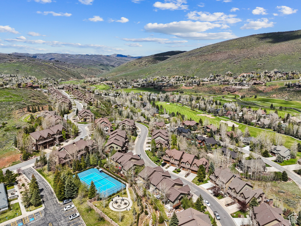 View of property location with nearby suburban area and a mountainous background
