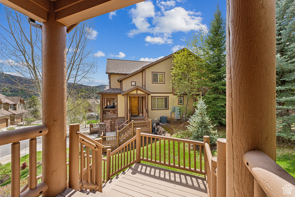 Wooden deck featuring a mountain view