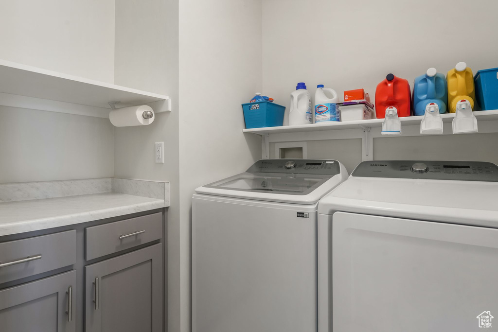 Washroom featuring separate washer and dryer