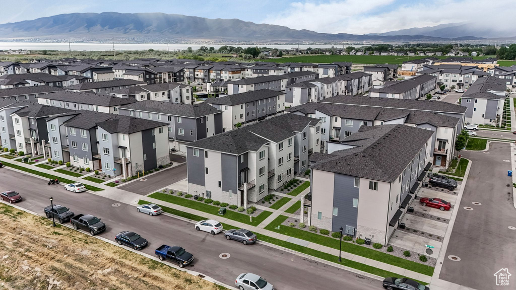 Aerial view of residential area featuring mountains