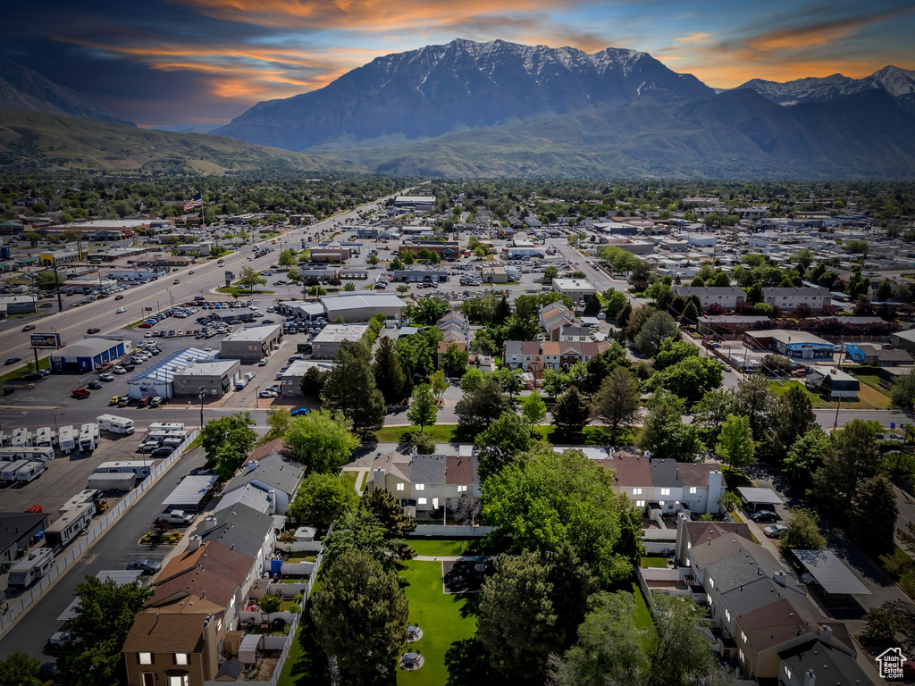 Aerial view at dusk of a mountain view and a residential view