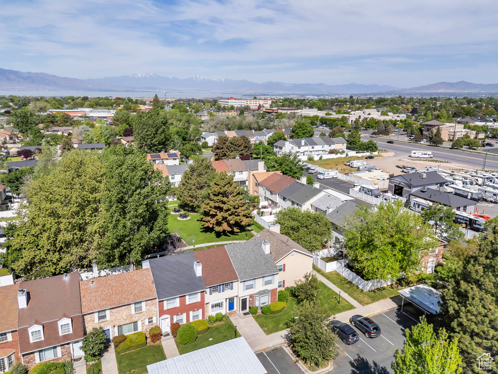 Aerial view of residential area with a mountainous background