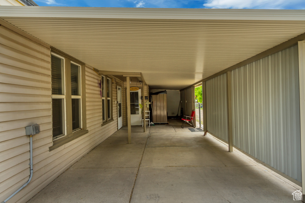 View of patio with an attached carport