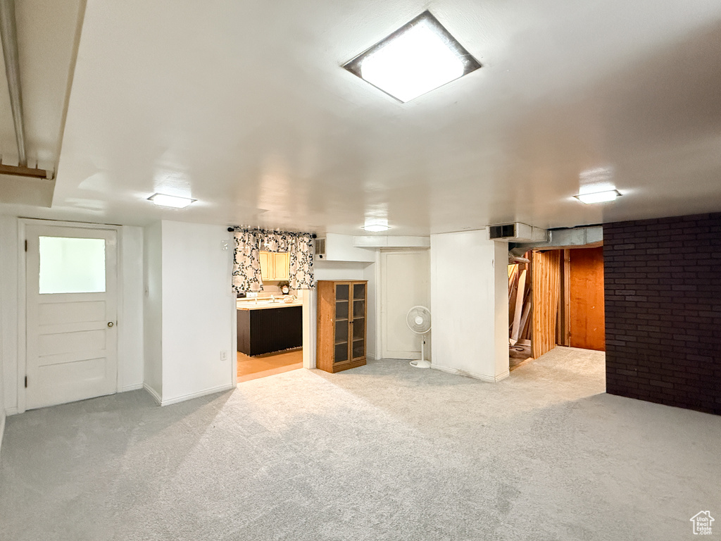 Below grade area with carpet flooring