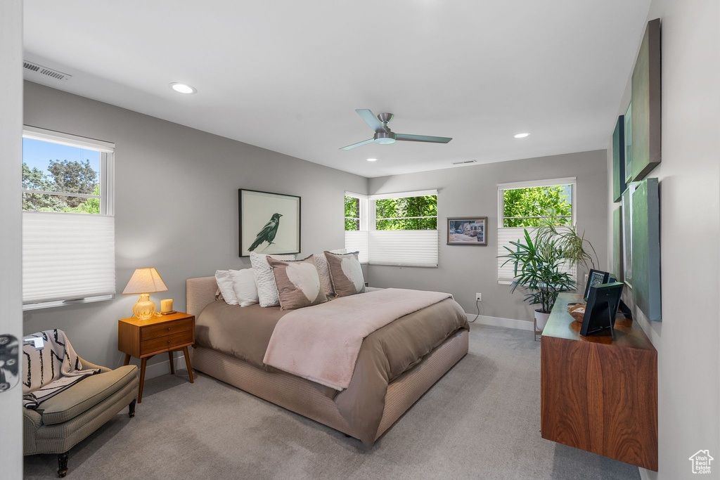 Carpeted bedroom with recessed lighting, baseboards, and ceiling fan