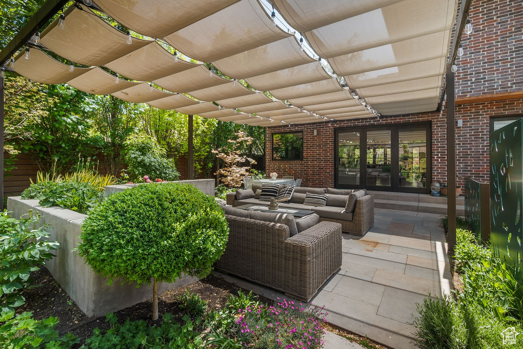 View of patio / terrace with a pergola and an outdoor hangout area