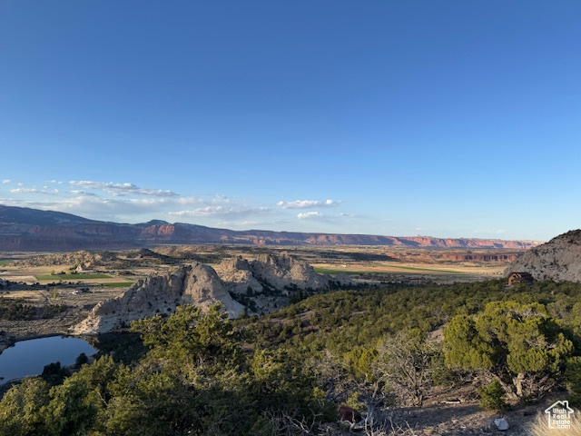 View of mountain backdrop with a nearby body of water