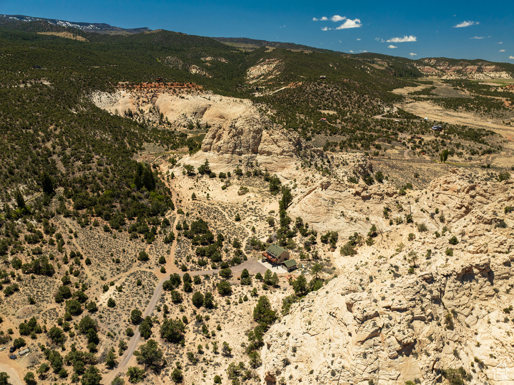 View of mountain backdrop with a desert landscape