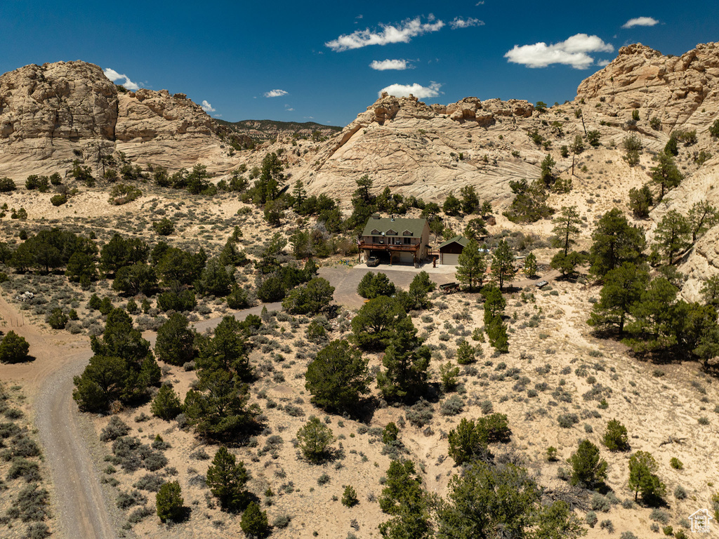 View of mountain backdrop with a desert landscape