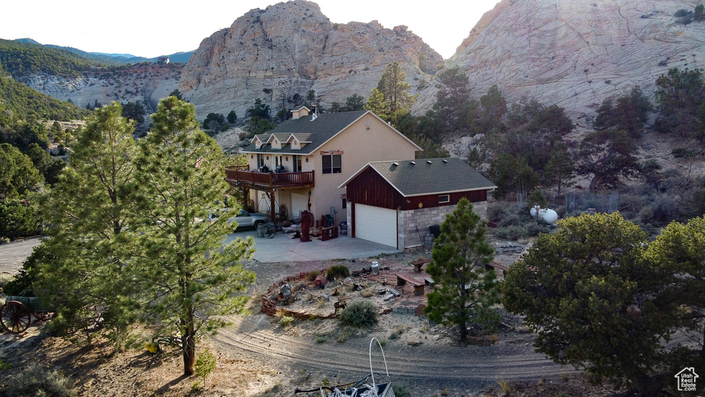 View of subject property with mountains