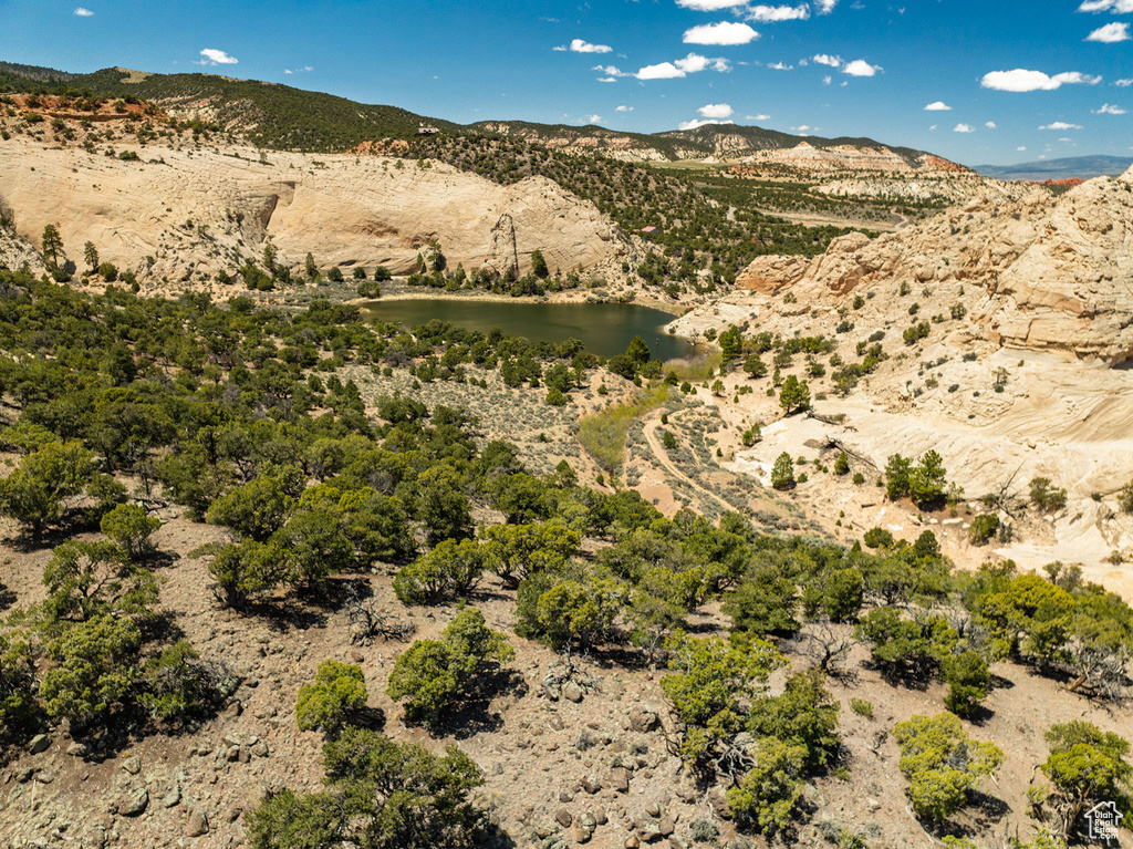 Mountain view featuring a nearby body of water