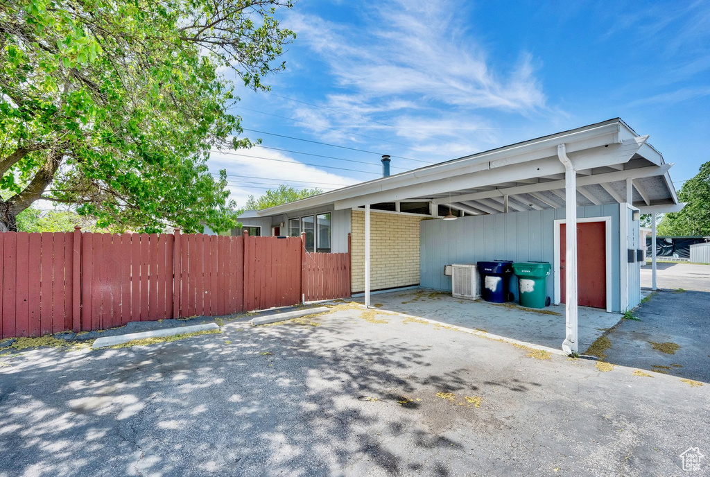 Uncovered parking lot with fence