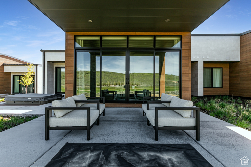 View of patio featuring french doors