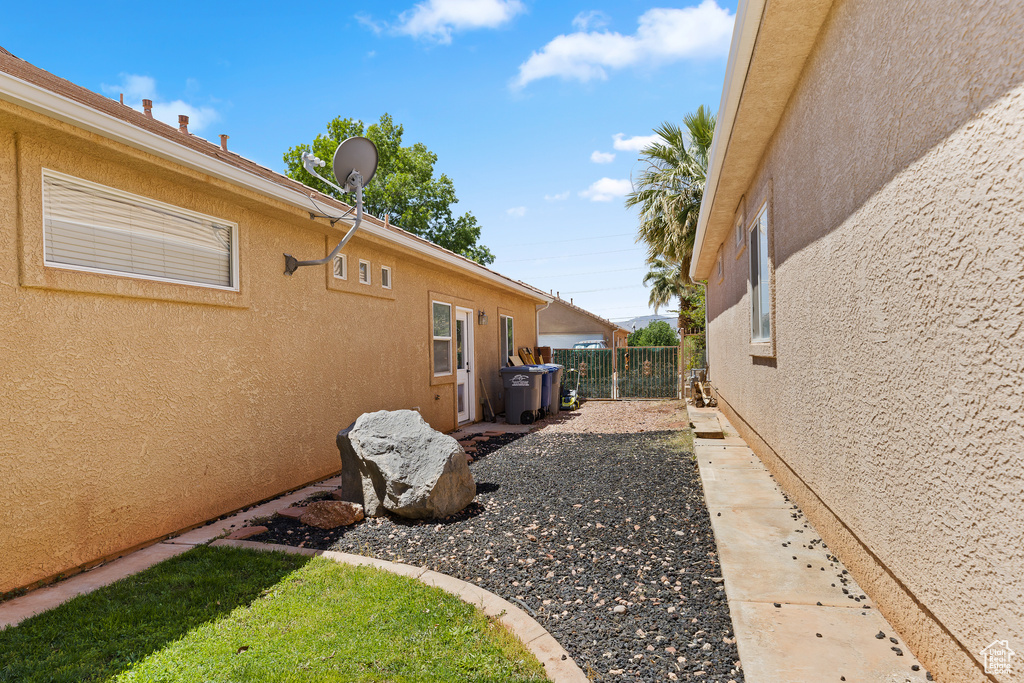 View of yard featuring fence