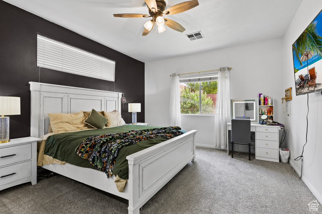 Bedroom featuring carpet floors and ceiling fan
