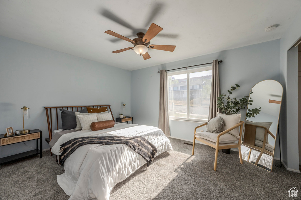 Bedroom featuring carpet floors and ceiling fan