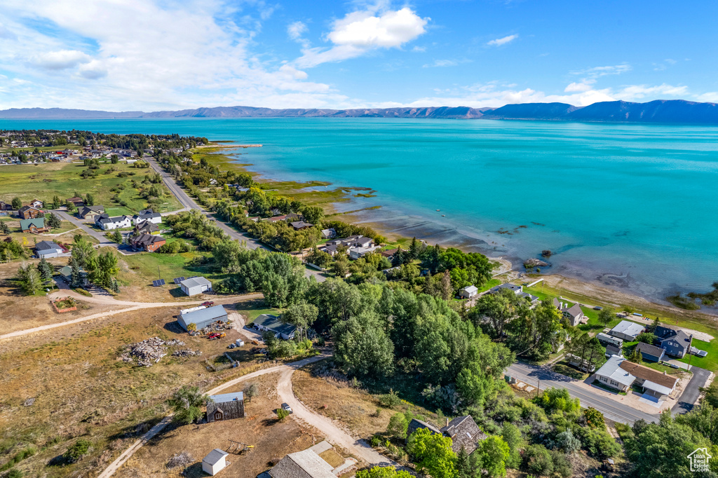 View of property location with a water and mountain view