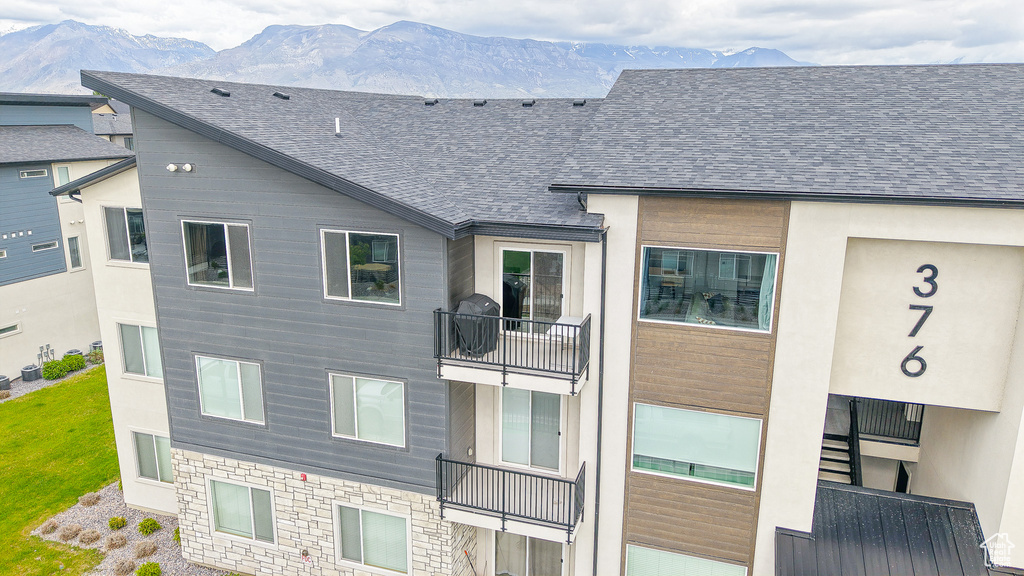 View of building exterior with a mountain view