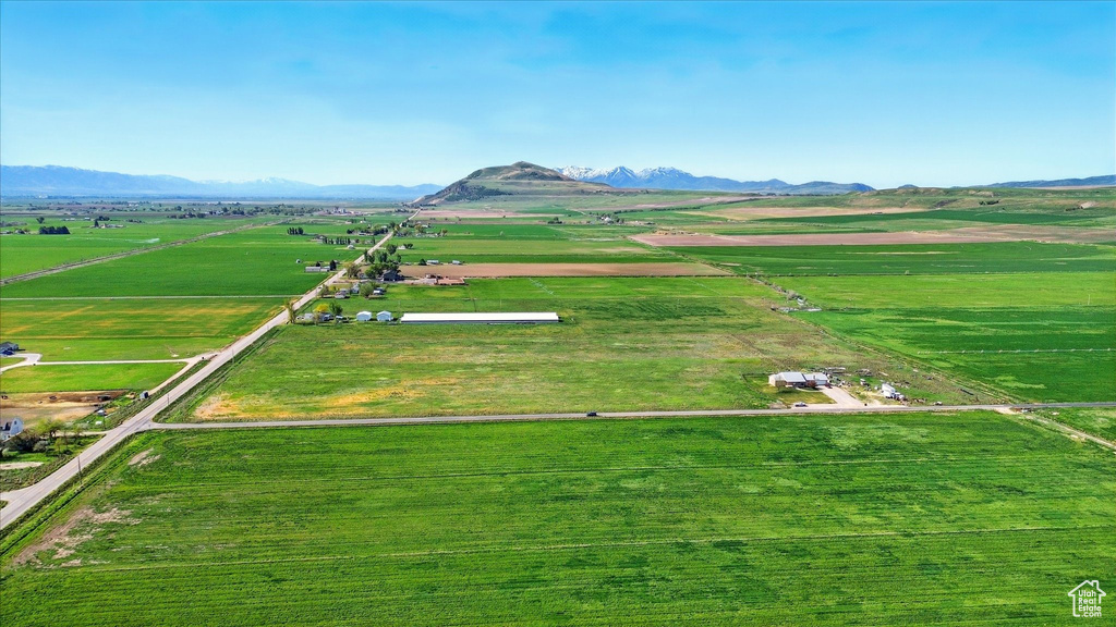 Aerial view of sparsely populated area with a mountainous background