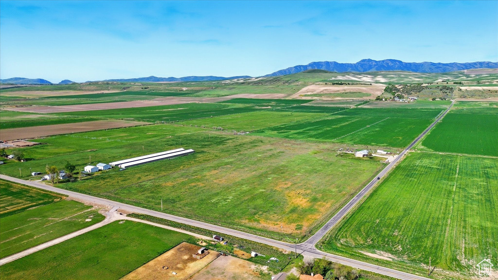 View of rural area featuring mountains and extensive farmland