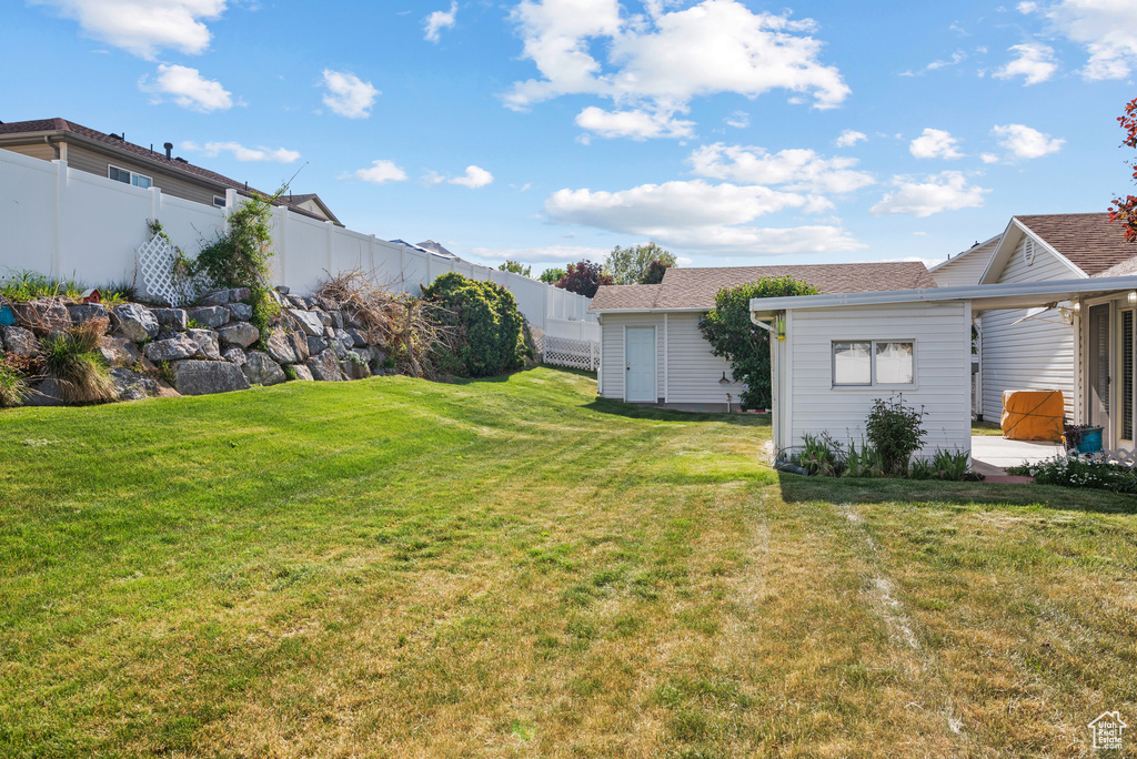 View of yard with a patio