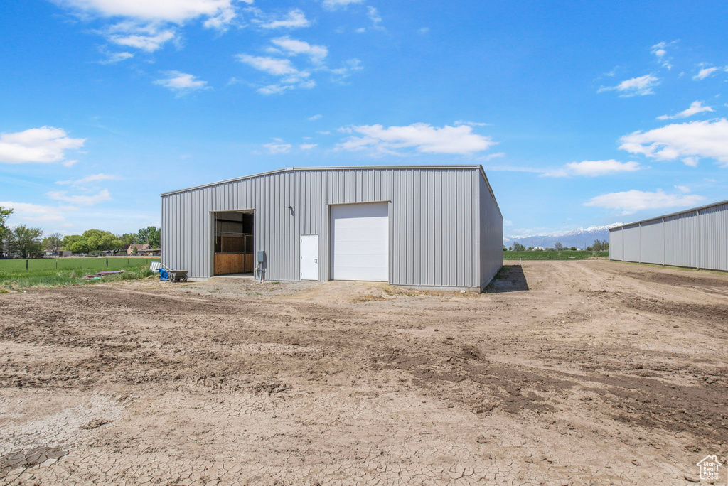 View of outdoor structure featuring an outbuilding