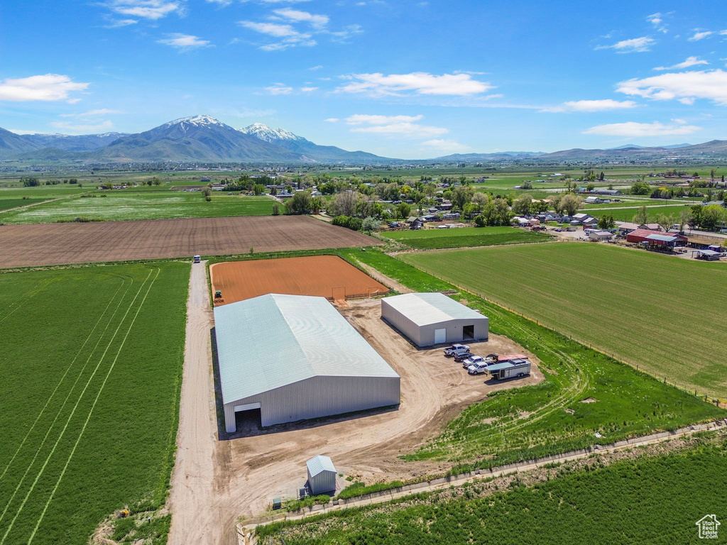 Aerial view of sparsely populated area with a mountain backdrop