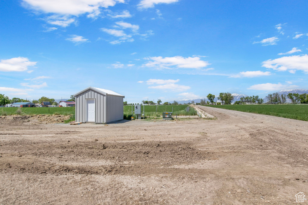 Exterior space featuring an outbuilding