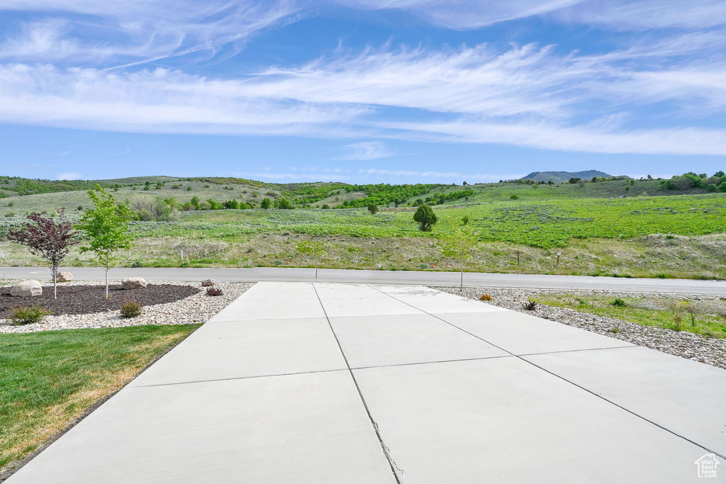 View of patio with a mountain view