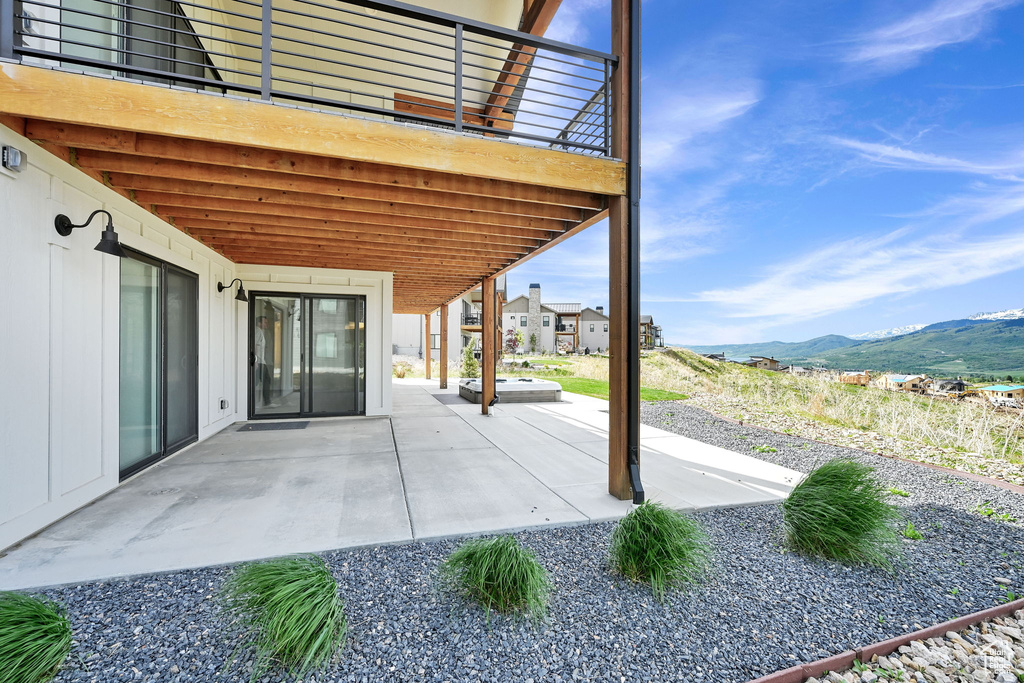 View of patio / terrace with a mountain view