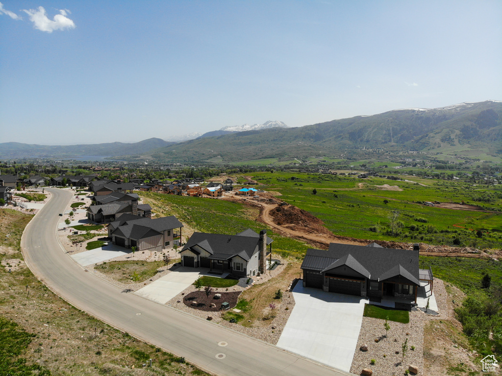 View from above of property featuring a mountainous background