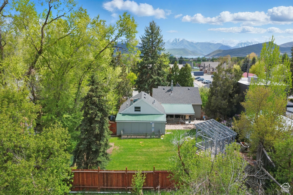 View from above of property featuring a mountainous background