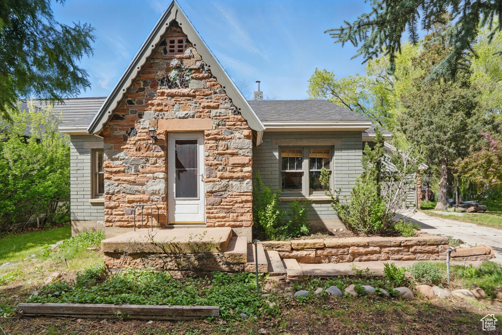 View of front of house featuring stone siding