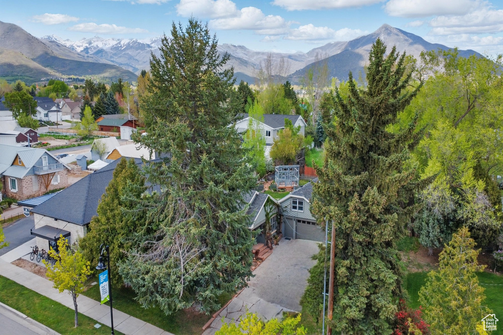 Aerial view of residential area with a mountainous background
