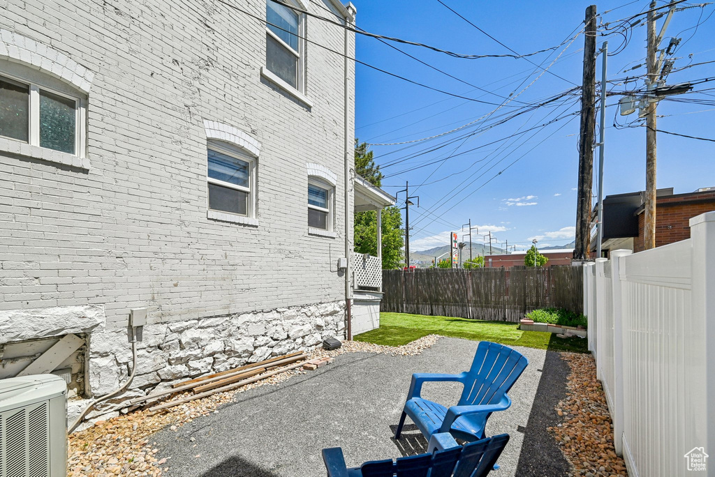 View of patio with central air condition unit
