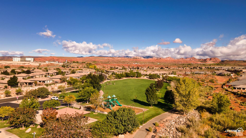 Aerial view of residential area featuring a mountain backdrop