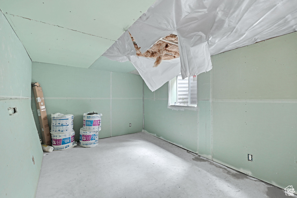 Bonus room with unfinished concrete flooring