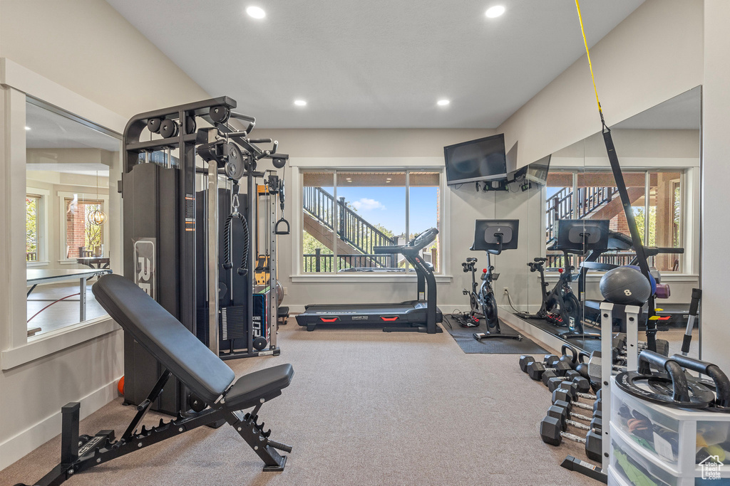 Exercise room with recessed lighting, carpet flooring, and baseboards