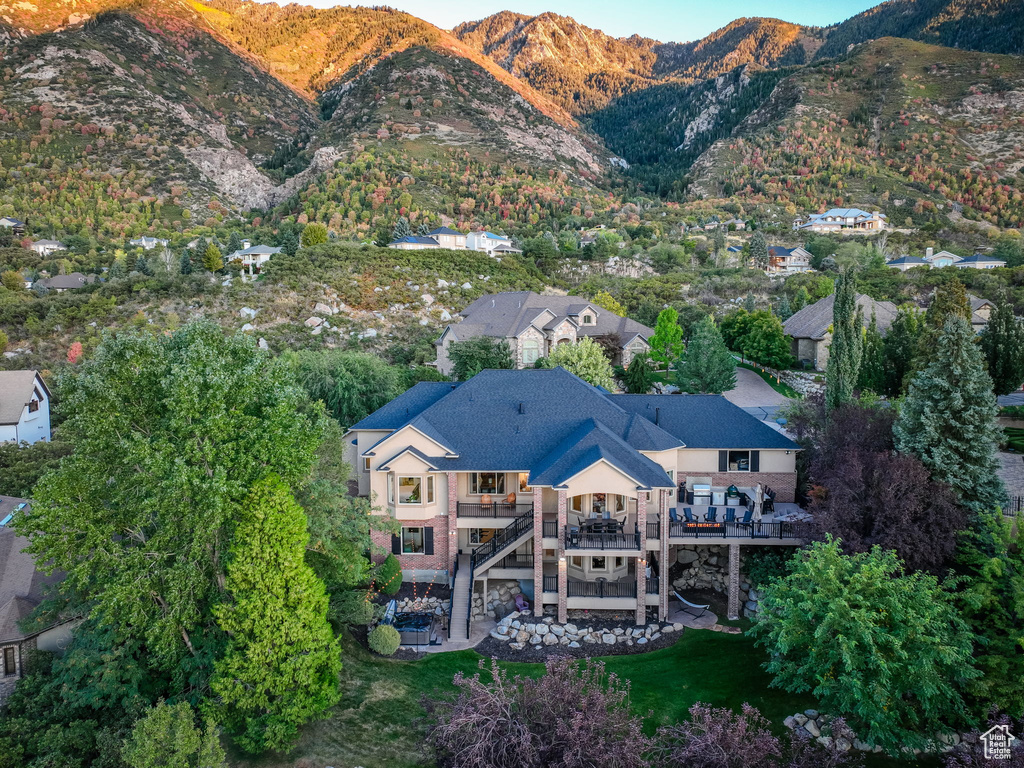 View of subject property with a mountainous background
