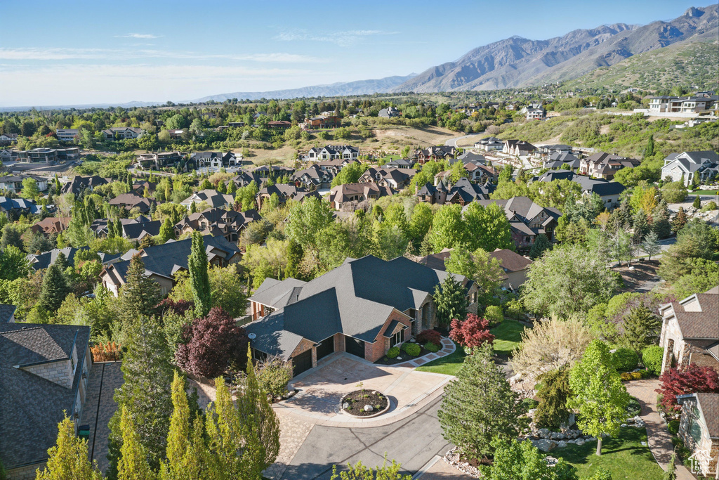 Aerial view of residential area with a mountain backdrop