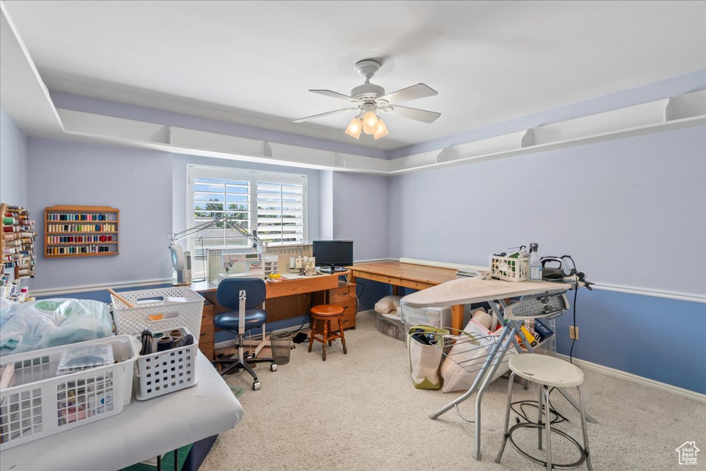 Office featuring carpet floors and ceiling fan