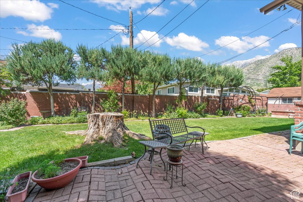 View of patio / terrace with a mountain view