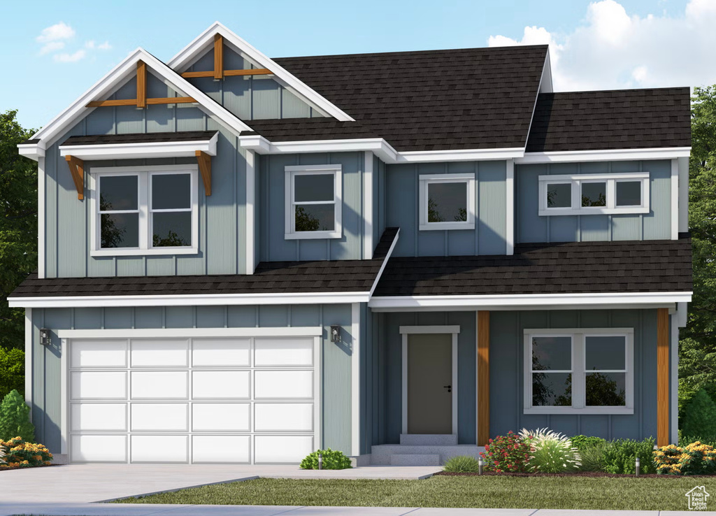 View of front facade with roof with shingles and a garage