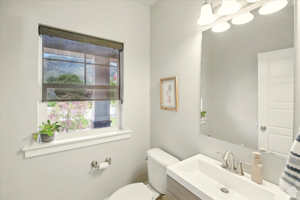 Bathroom with toilet and vanity