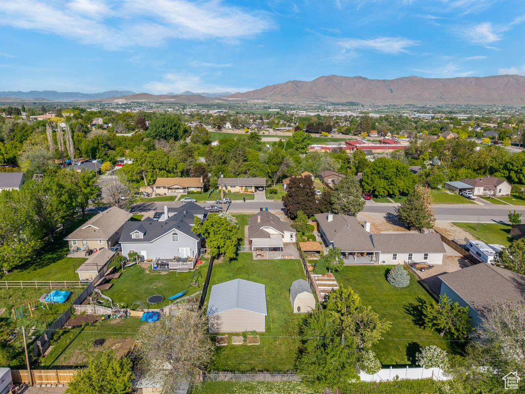 Aerial perspective of suburban area featuring mountains