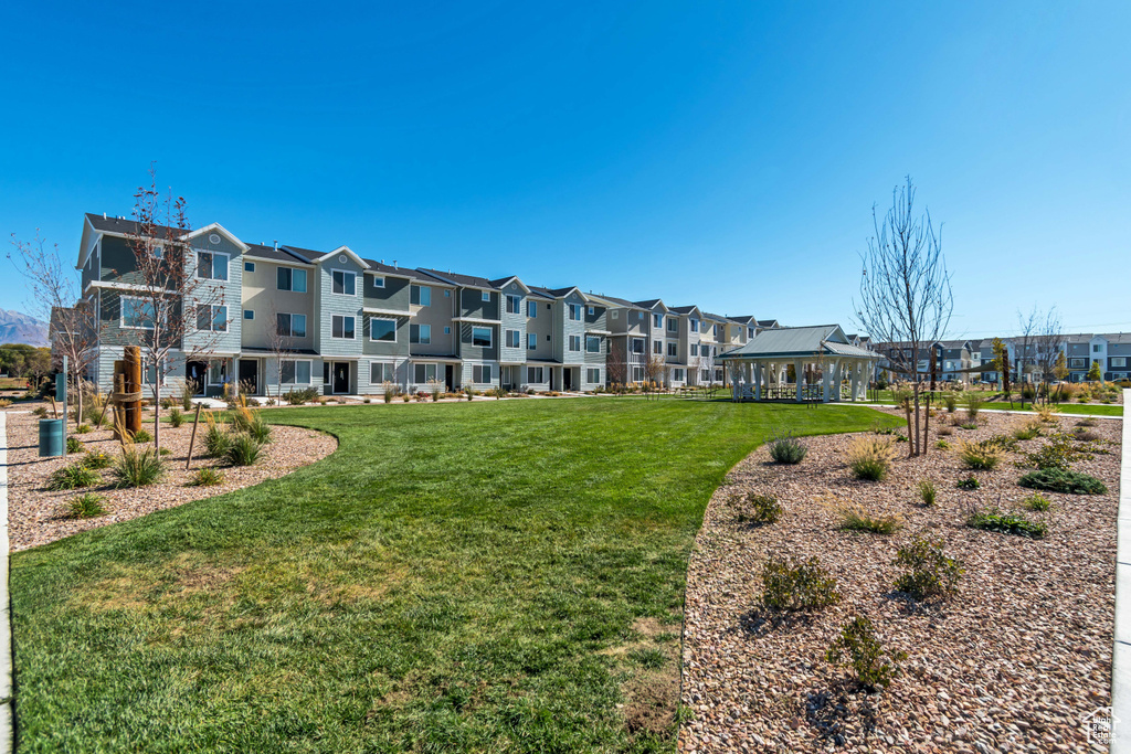 View of community with a lawn and a residential view