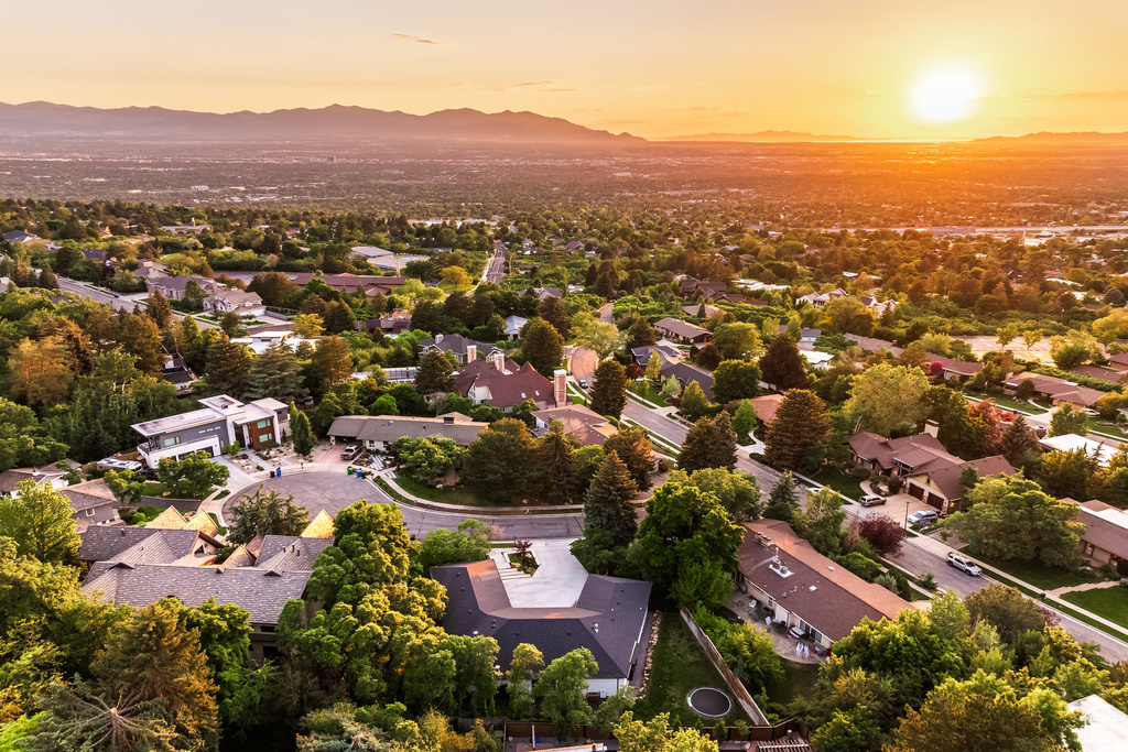 Aerial view of residential area with mountains